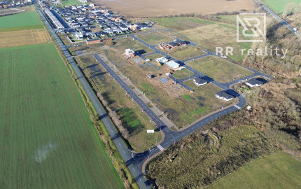 Stavebné pozemky-hotové všetky IS, chodníky, asfaltové cesty